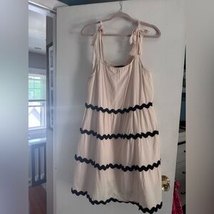 Chic Cream Dress with Black Accents